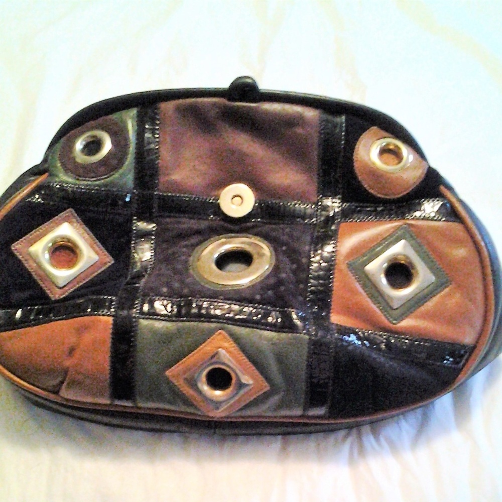 Hala cross body leather Purse.